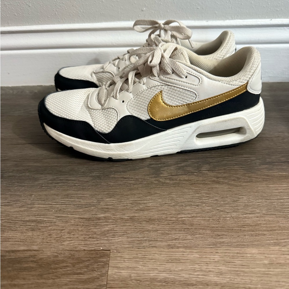 Nike Sneakers with Gold Accent